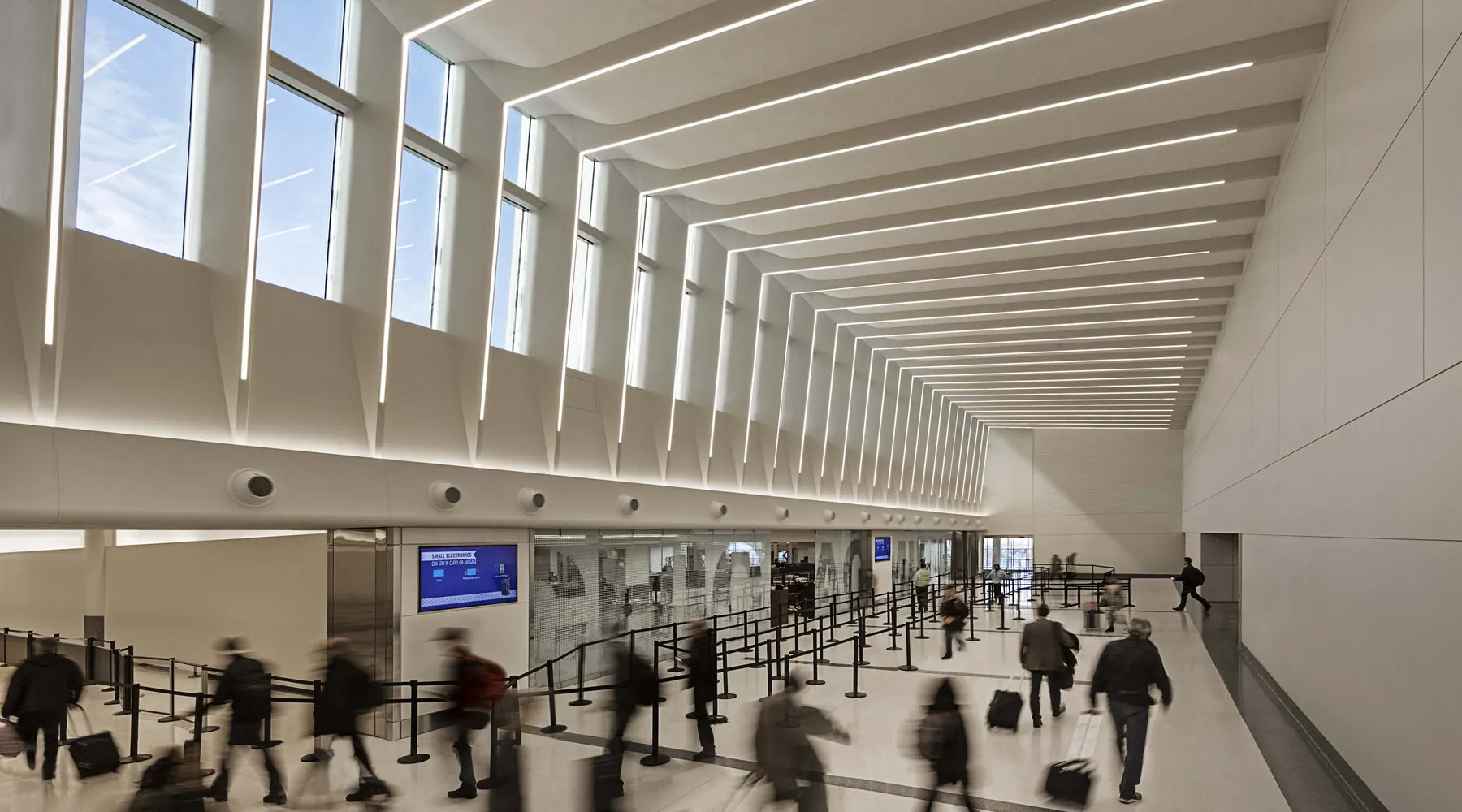 The bright, open concourse hall at Midway International Airport
