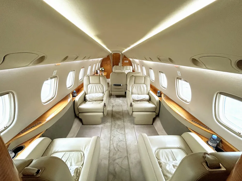 The cabin interior of a private business jet served by Chicago Executive Airport