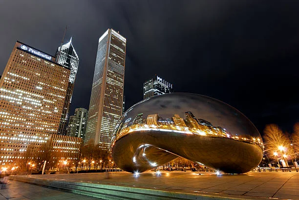 Cloud Gate at Millennium Park lit at night, a popular Chicago prom photo location